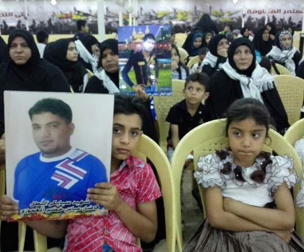 همایش تجلیل از خانواده شهدای حشد الشعبی در حله عراق برگزار شد