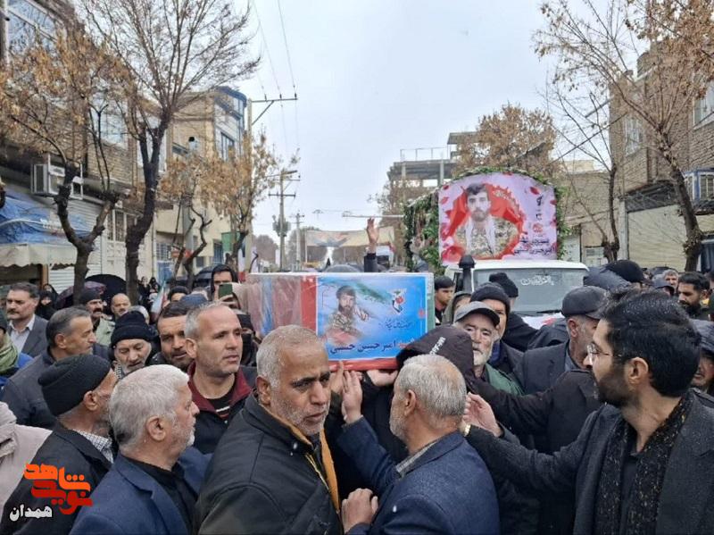 شهید امیرحسین حسنی در خاک آرام گرفت شهید امیرحسین حسنی در خاک آرام گرفت