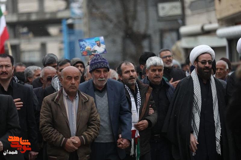 شهید امیرحسین حسنی در خاک آرام گرفت شهید امیرحسین حسنی در خاک آرام گرفت
