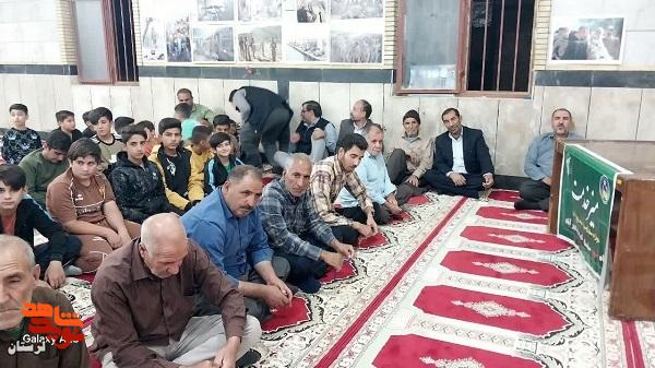 یادواره 8 شهید روستای گاوکش علیا برگزار شد