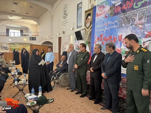 خانواده شهید «سیف الله اسدی مینا» تجلیل شد