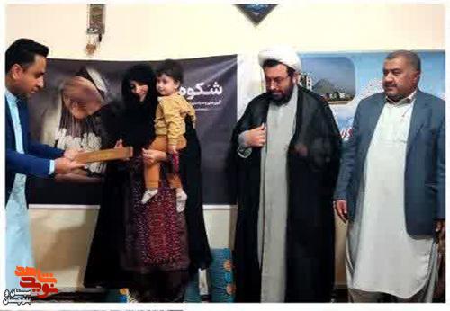 تجلیل از مادران و همسران شهدا در خاش همزمان با وفات حضرت ام‌ البنین (س)