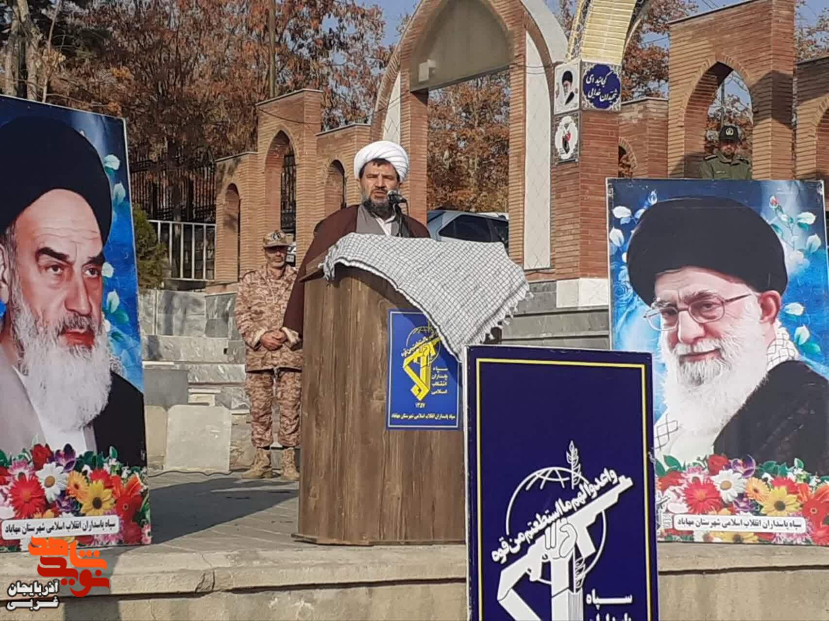 گلباران و غبارروبی مزار مطهر شهدای شماره یک مهاباد به مناسبت هفته مبارک بسیج