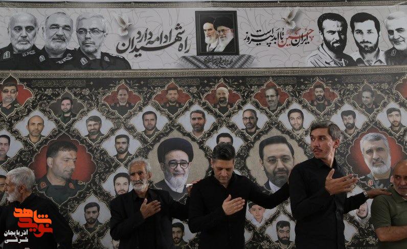اهتزاز پرچم حرم امام حسین (ع) بر فراز گلزار شهدای وادی رحمت تبریز