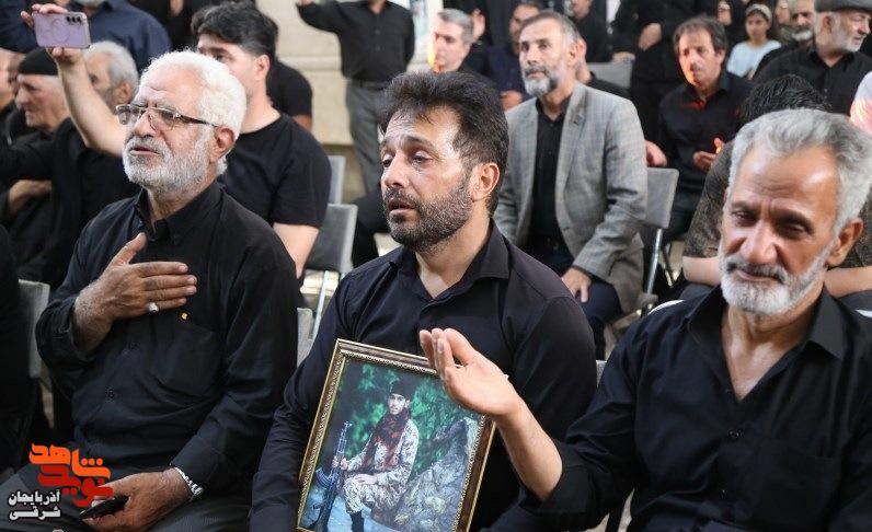 اهتزاز پرچم حرم امام حسین (ع) بر فراز گلزار شهدای وادی رحمت تبریز