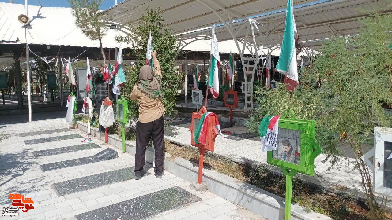 پرچم مقدس جمهوری اسلامی ایران بر فراز قبور مطهر ۷۲۰ شهید زاهدان برافراشته شد پرچم مقدس جمهوری اسلامی ایران بر فراز قبور مطهر ۷۲۰ شهید زاهدان برافراشته شد